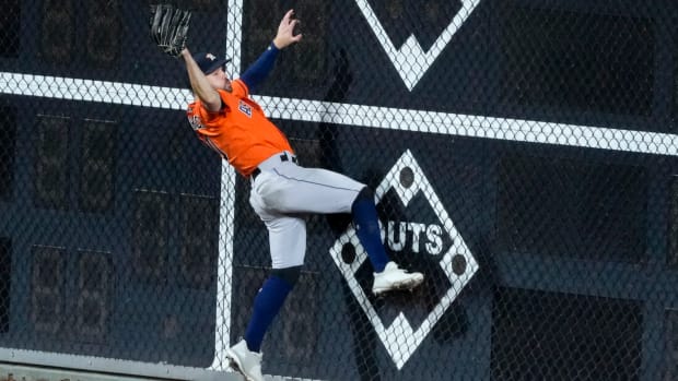 Chas McCormick makes a leaping catch in the World Series